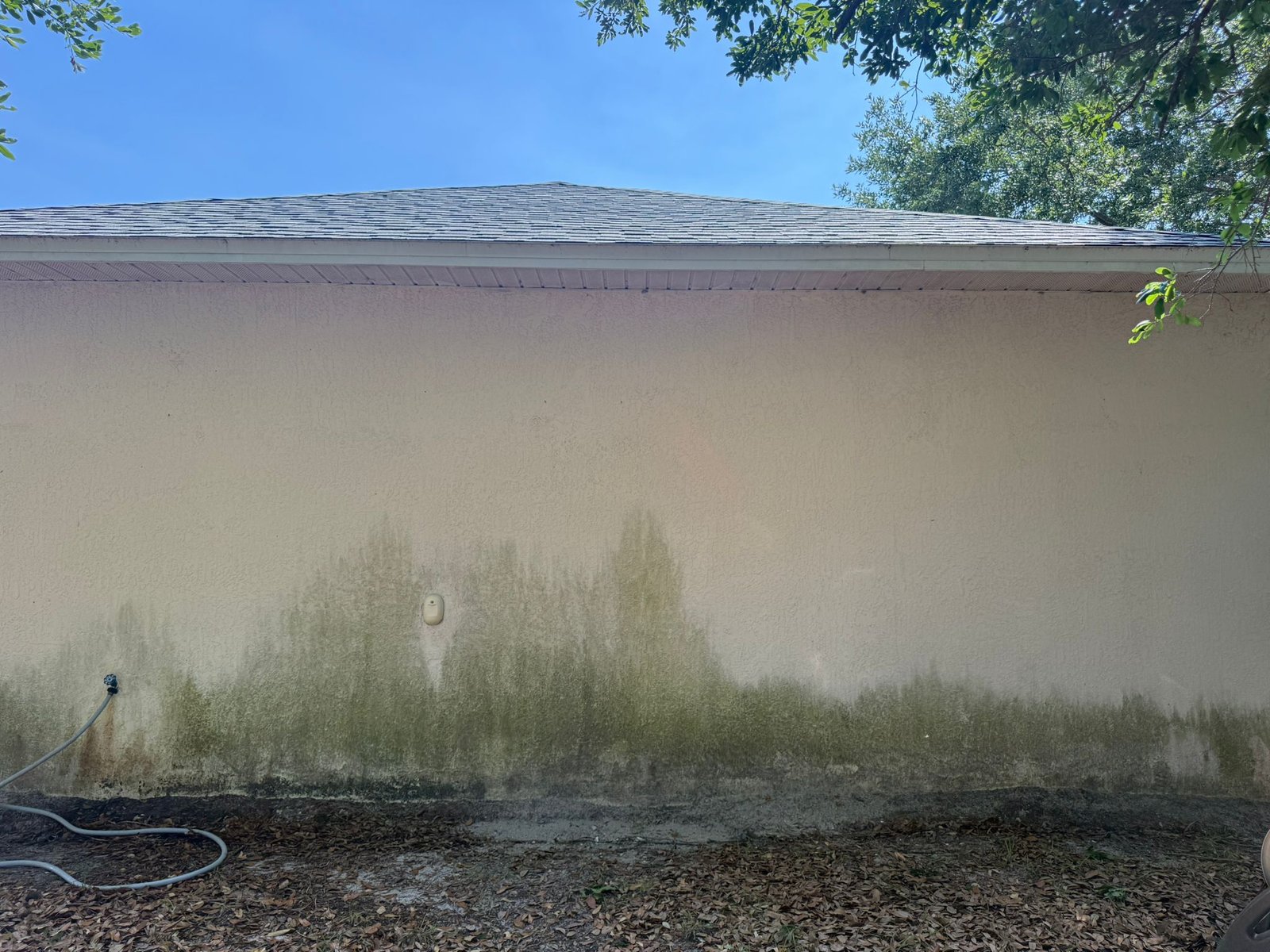 Wall after pressure washing